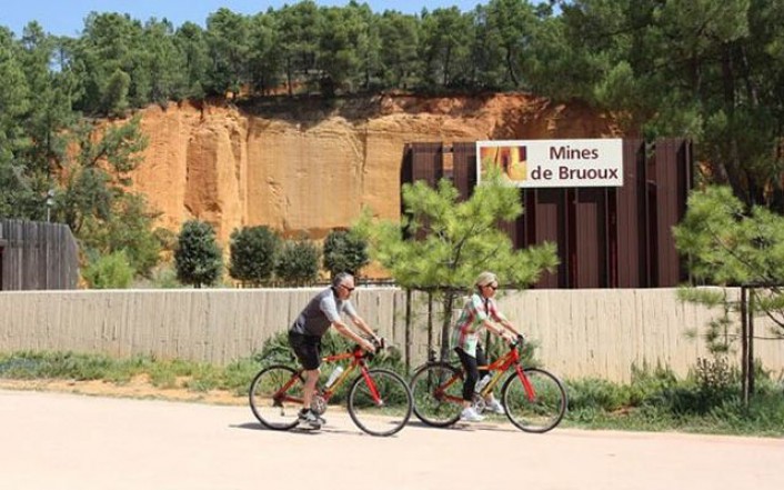 Cycling in the ochre-coloured landscape