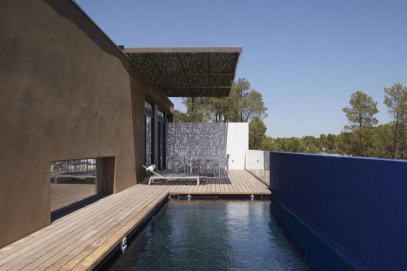 The pool is beautifully incorporated in the terrace